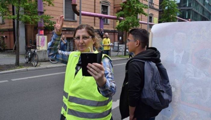 Syrian Woman in Germany Battles Regime Loyalists Over Phone - by Zaman al-Wasl (opposition website)