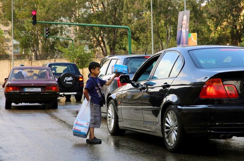A Syrian child sells tissues for drivers in Beirut, Lebanon, May 28, 2016. (AP/Bilal Hussein)