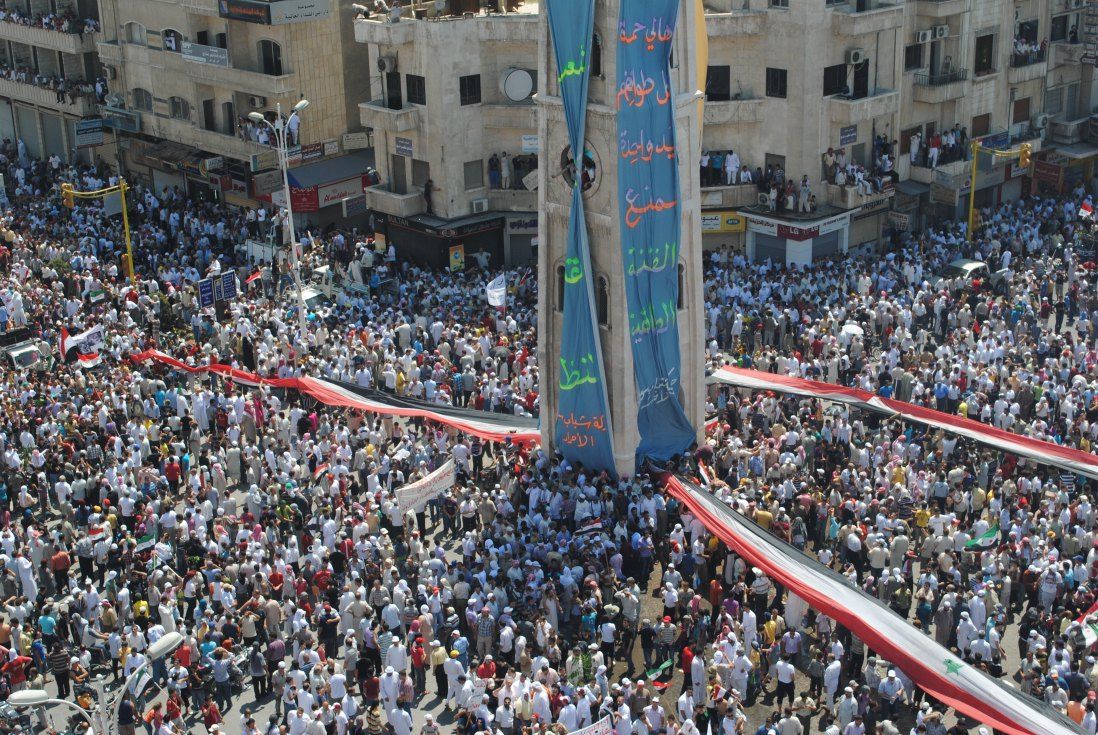 Syrians demonstrate against the government after Friday prayers in Hama on July 29, 2011. (AFP/Getty Images)