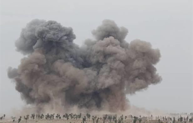 The bombing of Shanshrah, seen from Kafranbel. (Courtesy of Raed Fares)